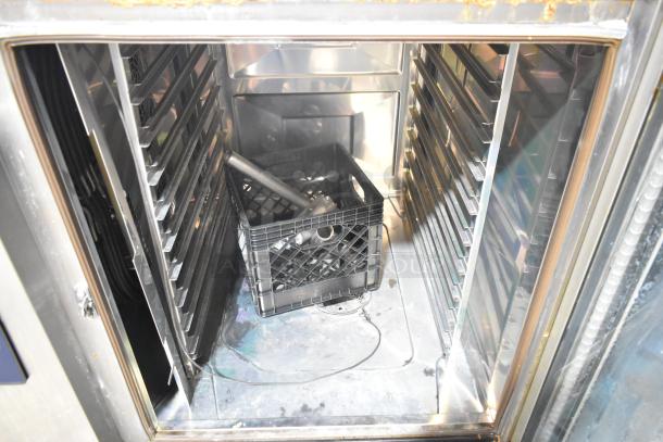 Rational LM100CE.AXXXX iCombi Pro combi oven, stainless steel, 440/480V, visible interior with racks and crate.