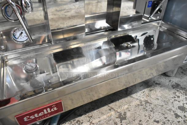 Brand new 2024 Estella ECEM2/N2 espresso machine, visible scratch and dent, stainless steel, 2 group, 220-240V.