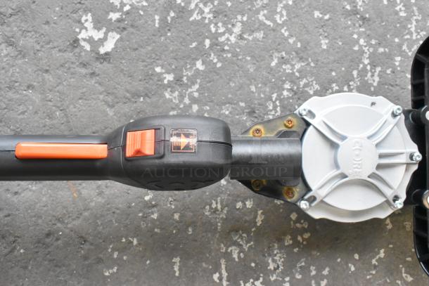 Core CHT410 Gasless Power Bush Trimmer, condition visible, with control handle and labeled motor casing.