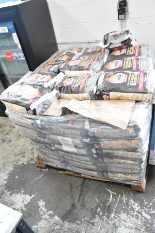 Pallet of 120 bags of Cooks Charcoal Briquets in plastic wrap, featuring original packaging. Ideal for grilling enthusiasts.