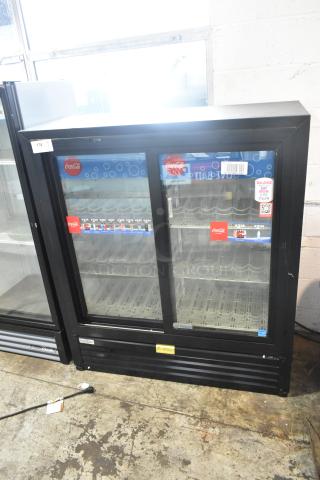 Imbera VRD41 metal commercial 2-door cooler, features poly-coated racks, visible Coca-Cola branding, 115V, 1-phase.