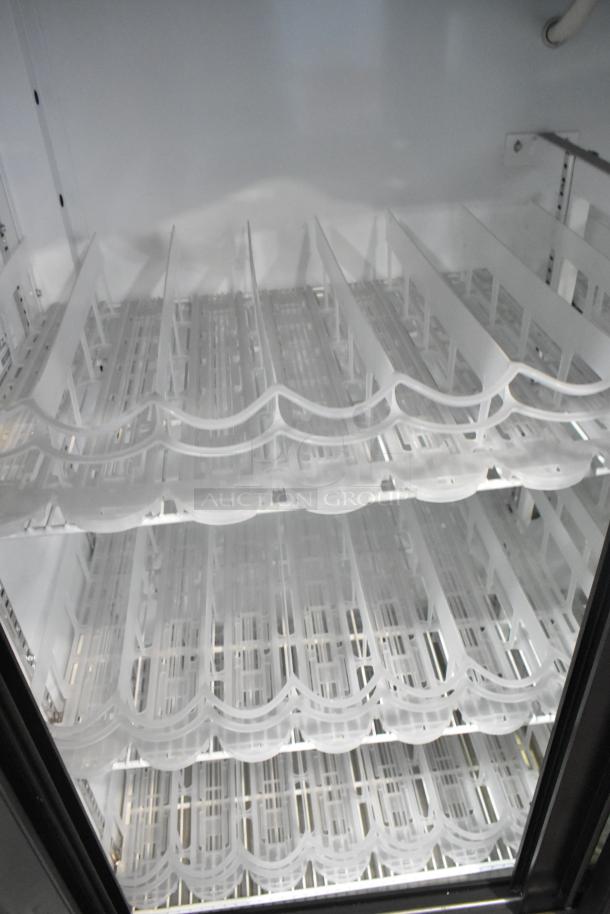 Imbera VRD41 metal commercial 2-door reach-in cooler, poly-coated racks, excellent condition, 115 volts, 1 phase.