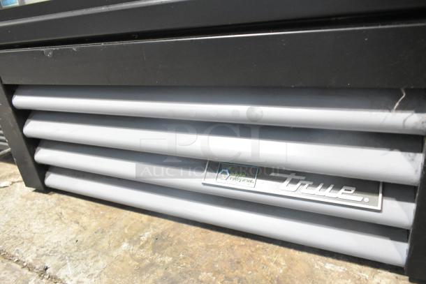 2021 True GDM-12-HC cooler base with louvers and logo, showcasing natural refrigerant label. 115V, 1 Phase, used condition.