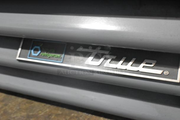 2021 True GDM-12-HC metal commercial cooler, single door, poly-coated racks, 115 volts, 1 phase. True logo visible.