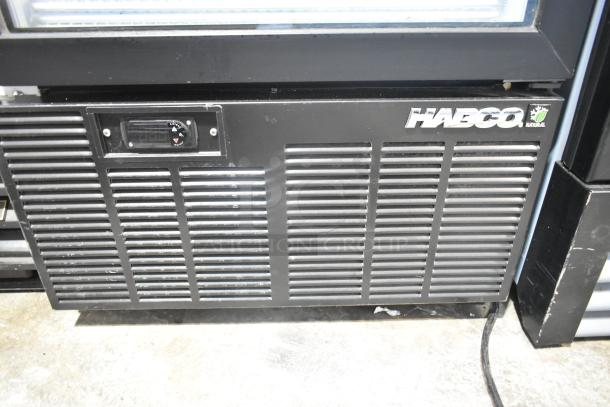 2019 Habco SE18 metal reach-in cooler with single door, poly-coated racks, 115 volts, 1 phase. Logo and digital display visible.