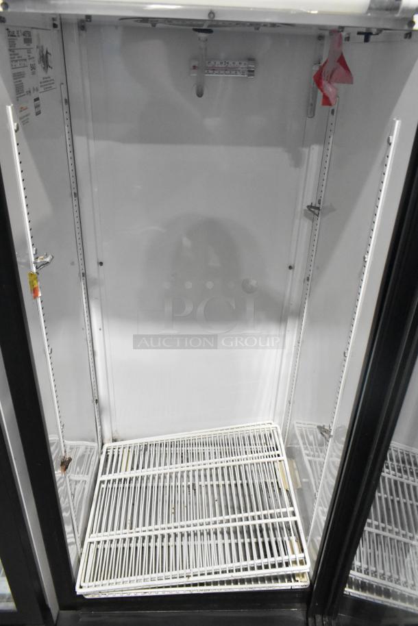 2021 True GDM-12 commercial single-door cooler with poly-coated racks. 115 volts, 1 phase, used condition.