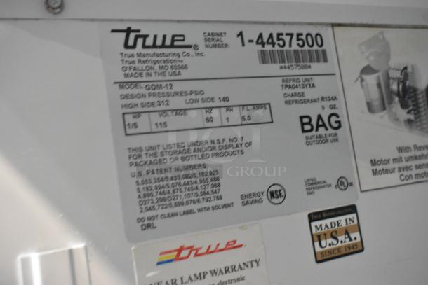 2021 True GDM-12 commercial cooler label showing model, serial number, usage instructions, and Made in USA marking. 115V, 1 phase.