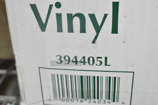 Two-tier lot of new gloves, includes Noble Products 394405L powder-free vinyl gloves. Box label with barcode visible.