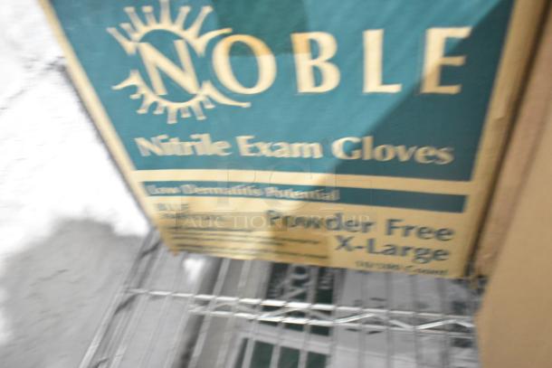 Two-tier lot of various brand new gloves, including Noble Products Powder-Free Vinyl and Nitrile Gloves for foodservice.