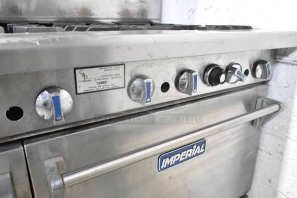 Imperial Stainless Steel Commercial Gas Griddle with 6 burners, convection and standard oven, over shelf, backsplash.