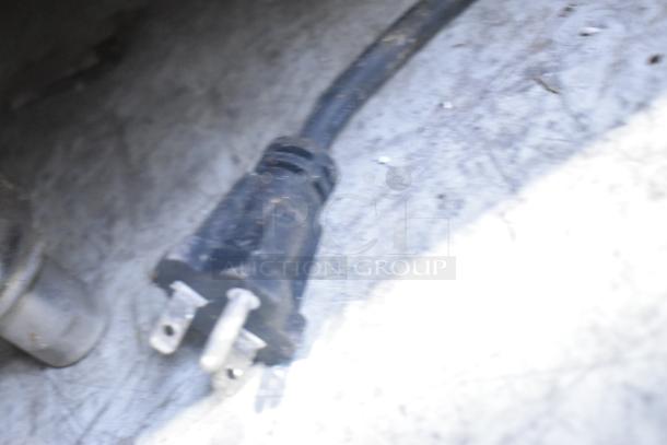 Power plug of Cecilware EL-1636 griddle, showing a standard three-prong connector for electric use.