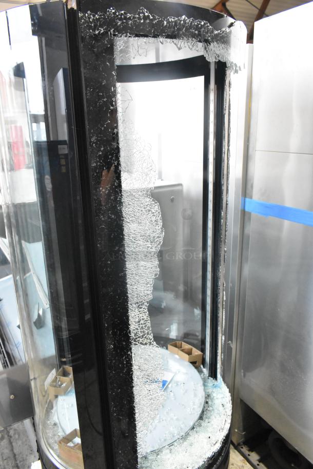 Avantco 193BCR15HCB black circular refrigerated display case, glass damage visible, on commercial casters, 115V, 1 phase.
