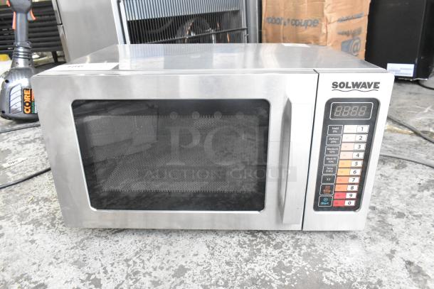 Brand new Solwave 180MW1000SS stainless steel commercial microwave, scratch and dent, with push button controls.