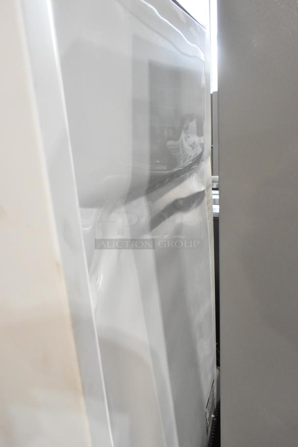 Brand new True TSCI-600R-G-PH reach-in cooler with dents, broken glass, and poly-coated racks. 115V, 1 phase.