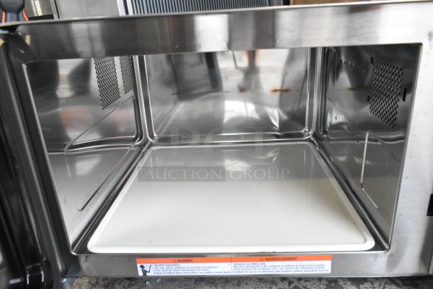 Brand new Solwave 180MW1000SS stainless steel commercial microwave interior. Scratch and dent condition.