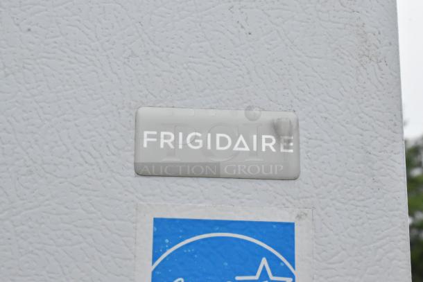 Frigidaire FFUH21F2NWA metal single door freezer, with visible logo. Model powered by 115V, 1 phase. Suitable for reach-in use.