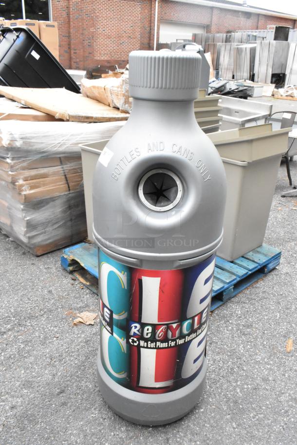 Gray bottle-shaped recycling bin for bottles and cans, with colorful "Recycle" label. Good condition.