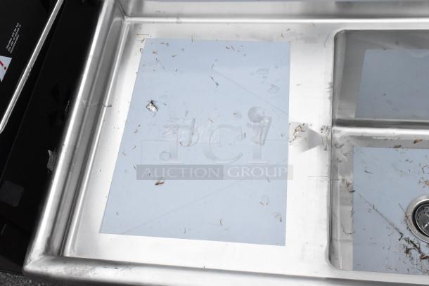 Stainless steel Regency 600S1181818L single bay sink with left drain board, brand new scratch and dent condition.