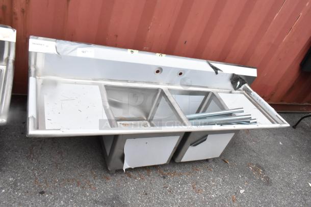 BRAND NEW Regency 600S21818218 stainless steel 2-bay sink with dual drain boards, scratch and dent condition.