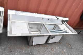 BRAND NEW Regency 600S21818218 stainless steel 2-bay sink with dual drain boards, scratch and dent condition.