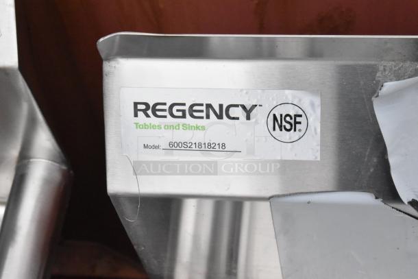 Regency stainless steel 2 bay sink with dual drain boards, model 600S21818218, NSF certified. New with minor scratches.