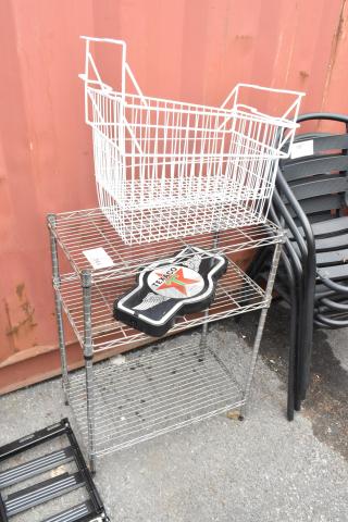 Chrome finish 3-tier wire shelving unit with contents, including a white wire basket and Texaco sign. Buyer must dismantle.
