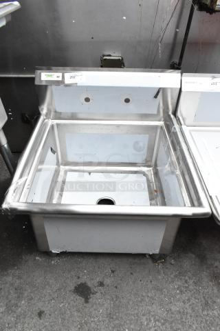 BRAND NEW SCRATCH AND DENT! Regency 600S12323 stainless steel single bay sink, no legs, visible minor wear.