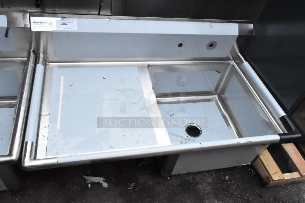 Brand new Regency 600S1232324L stainless steel single bay sink with left side drain board. Scratch and dent condition.