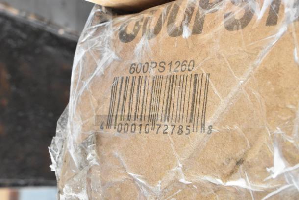 Barcoded cardboard box labeled "600PS1260." Plastic wrap partially covers the box, indicating new condition.