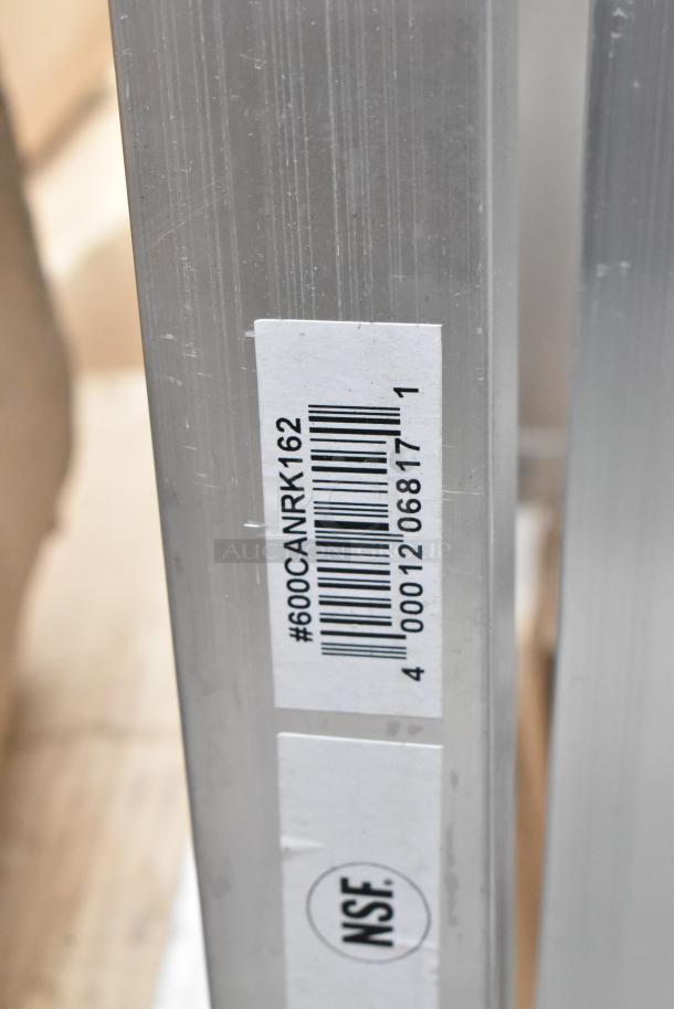 Label on aluminum can rack showing model #600CANRK162 and NSF certification.