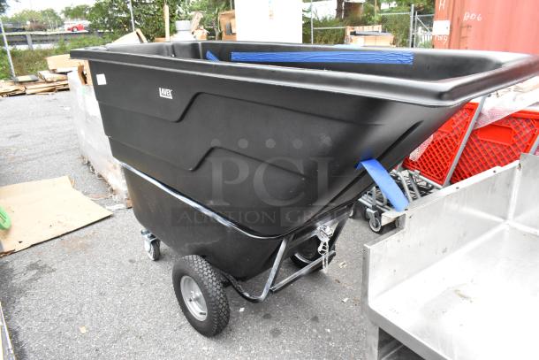 BRAND NEW Scratch and Dent black poly tilt truck, Lavex brand, on wheels, minor cosmetic imperfections visible.