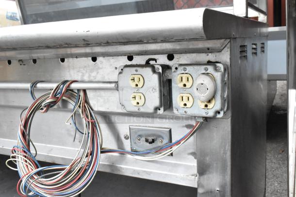 L&J CWS stainless steel steam table with sneeze guard, under shelf, and natural gas hookup. Features multiple wiring outlets.