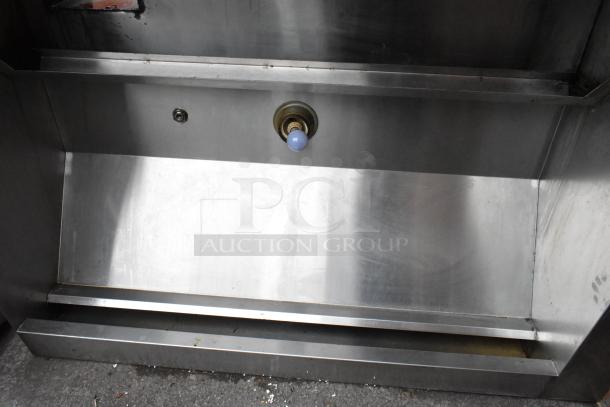 5.5' stainless steel commercial grease hood, clean condition, with a control knob, ideal for restaurant kitchens.