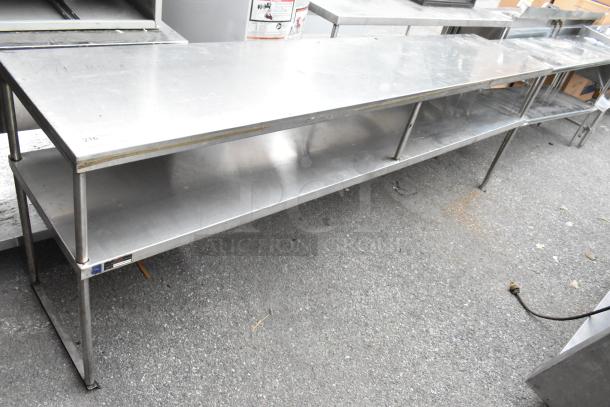 Stainless steel 2-tier overshelf, durable construction, industrial use, slight surface wear, includes labeling for identification.