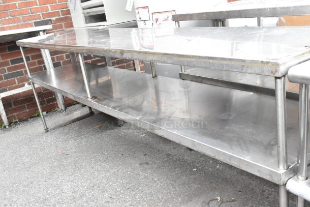 Stainless steel 2-tier overshelf, sturdy construction, moderate wear, suitable for commercial kitchen use.