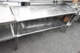 Stainless steel 2-tier overshelf with APW Wyott warming strip, 120 volts, 1 phase. Used condition, minor surface wear visible.