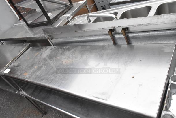 Stainless steel 2-tier overshelf with APW Wyott warming strip, 120 volts, single phase. Appears in used condition.