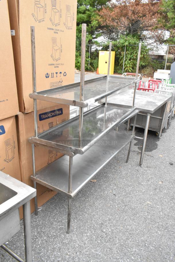 2 stainless steel 2-tier overshelves in good condition, ideal for kitchen or storage, efficient use of space, durable design.