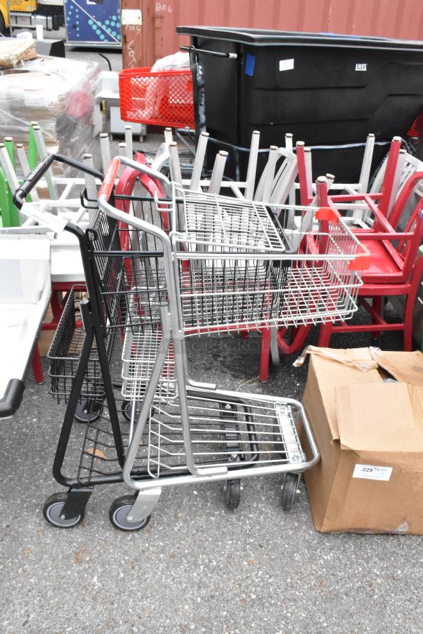 Brand new metal 2-tier shopping carts on commercial casters, scratch and dent condition, auction includes two carts.