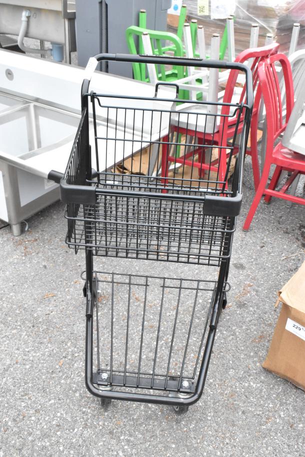 Brand new metal 2-tier shopping cart on commercial casters, scratch and dent condition. Black finish, ergonomic handle.