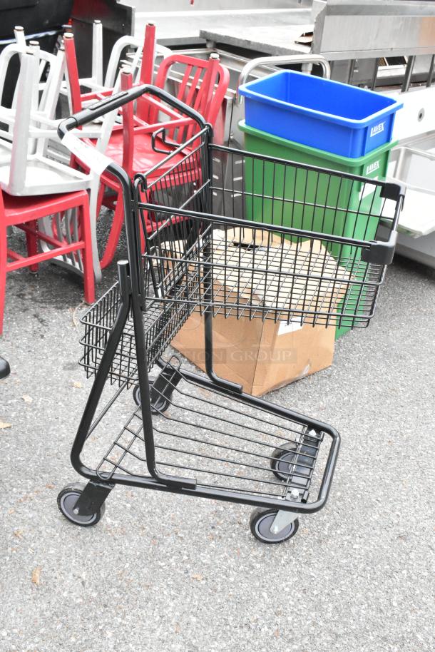 Brand new metal 2-tier shopping cart on commercial casters, minor scratches and dents, ready for auction.
