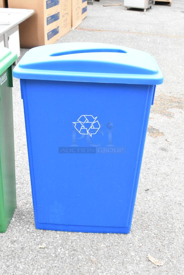 Blue Lavex Poly Slim Jim recycling bin, brand new with scratch and dent. Features recycling symbol on front.
