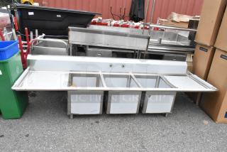BRAND NEW Regency 600S31824224 3 bay stainless steel sink with dual drain boards, scratch and dent condition.