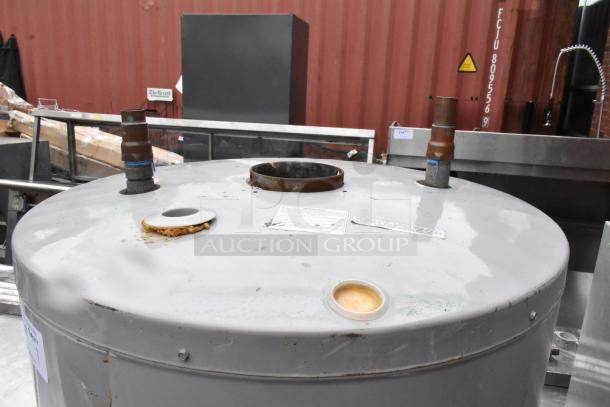 AO Smith BT-80 400 natural gas water heater, 75,100 BTU, metal construction, visible wear, factory labels present.