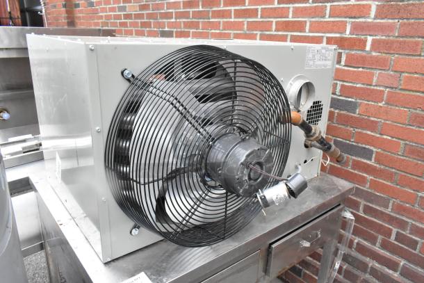 Modine HD 100AS0111FBAN metal commercial heater, 115V, 1 phase, features sturdy fan and wiring, in good condition.