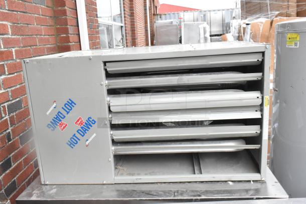 Modine HD 100AS0111FBAN commercial heater, 115 volts, 1 phase, metal construction, "Hot Dawg" logo visible, used condition.