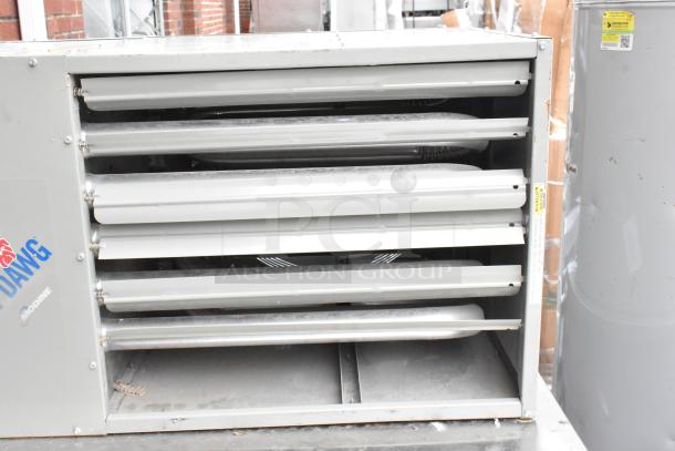 Modine HD 100AS0111FBAN metal commercial heater, 115V, 1 phase, visible front grille, minor exterior wear.