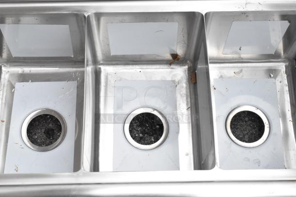 BRAND NEW KoolMore SC101410-12L3 stainless steel 3 bay sink with left side drain board, minor scratches visible.