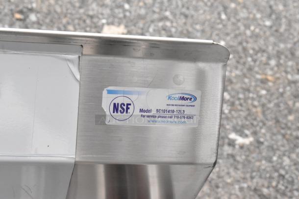 Stainless steel 3 bay sink by KoolMore, model SC101410-12L3. Features left side drain board, NSF certification tag visible.