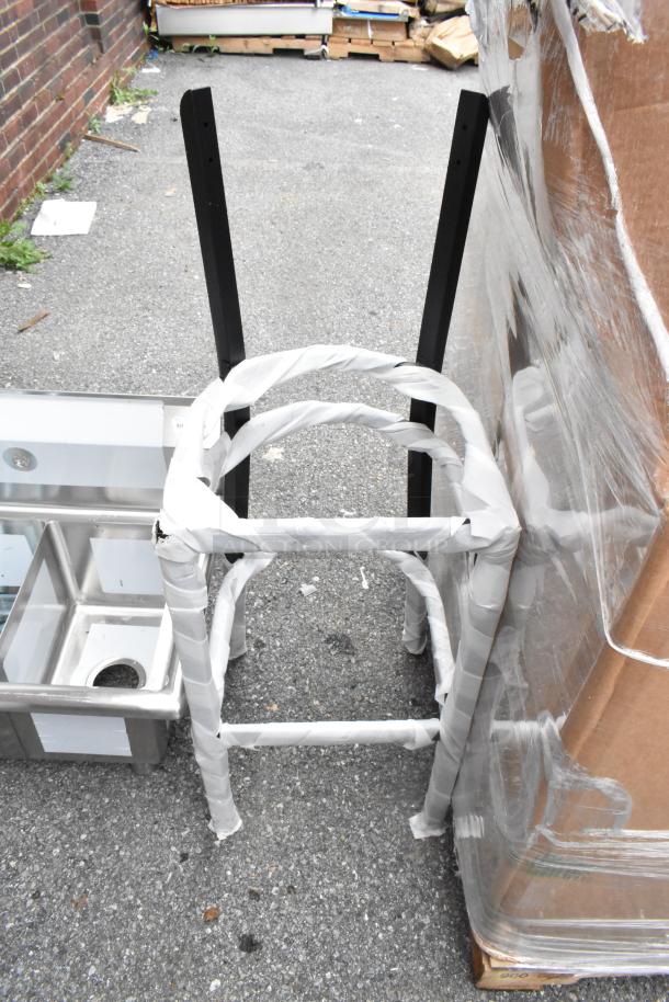 Brand new metal bar height chair frames without cushions or backrests, wrapped with protective material, minor scratches.